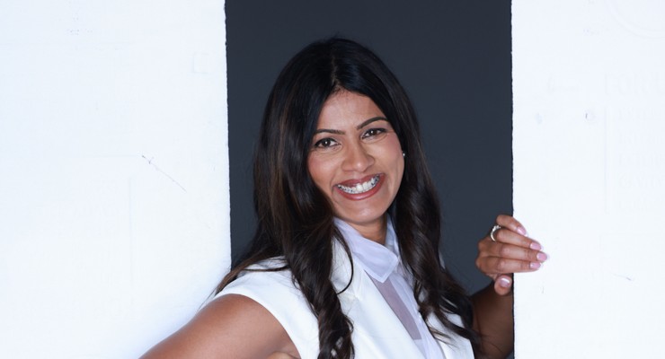 Dr. Sonal Patel laughing in a doorway